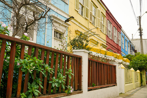 Colorful Rows of Houses in Valparaiso: A picturesque scene of charming houses nestled closely together, each painted in vibrant hues, adding character to the lively streets.