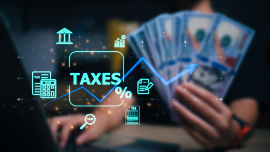 Concept of taxes paid by individuals and corporations such as VAT, income tax and property tax.
