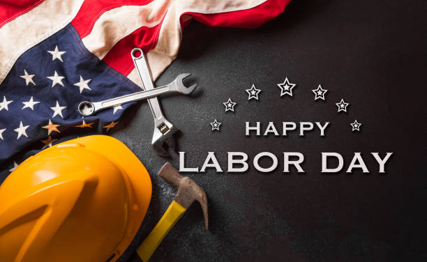 istock Happy Labor day concept. American flag and different construction tools with the text on dark background. 1620013762