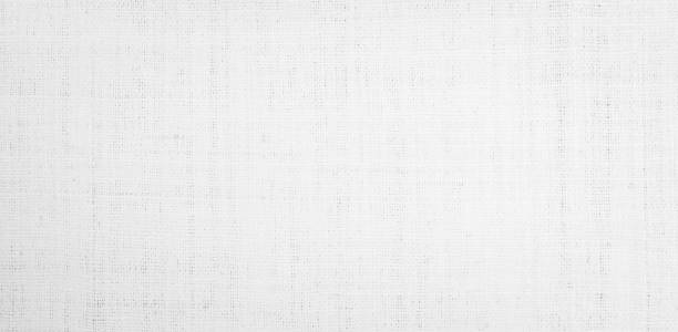 istock Fabric canvas woven texture background in pattern light white color blank. Natural gauze linen, carpet wool and cotton cloth textile textured as clean empty for decoration text. Grey sack material. 1620077040