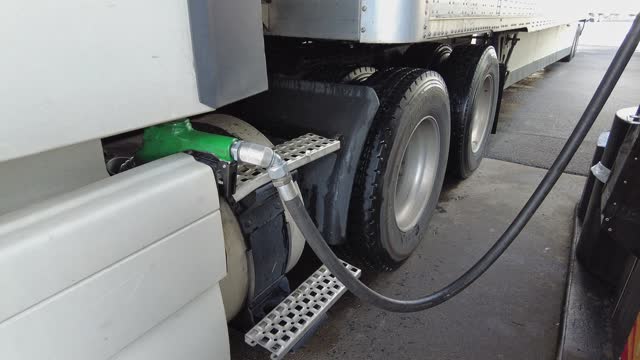 semi-truck on gas station. truck fueling