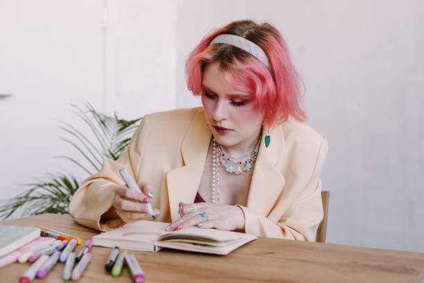istock workplace of art student, drawing with markers at table 1620148949