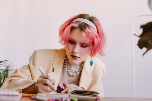 istock workplace of art student, drawing with markers at table 1620150065