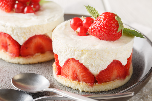 Strawberry double fromage cheesecake on concrete table