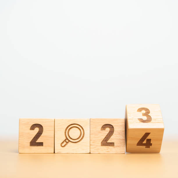 istock 2024 block with magnifying glass icon. SEO, Search Engine Optimization, hiring , Advertising, Idea, Strategy, marketing, Keyword, Content and New Year start concepts 1620249536