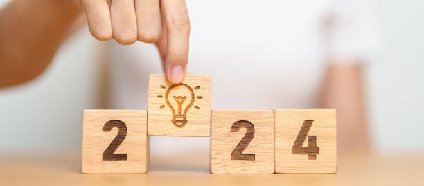 istock 2024 block with lightbulb. Business Idea, Creative, Thinking, brainstorm, Goal, Resolution, strategy, plan, Action, change and New Year start concepts 1620250611