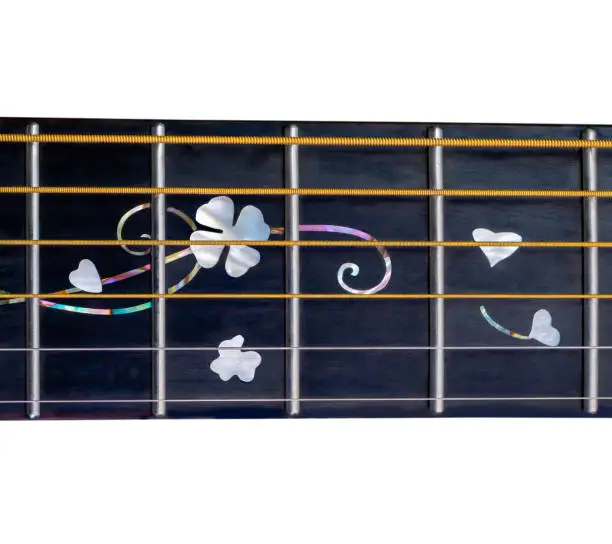 Guitar fingerboard isolated on white,flower and heart style, inlay made from abalone shells