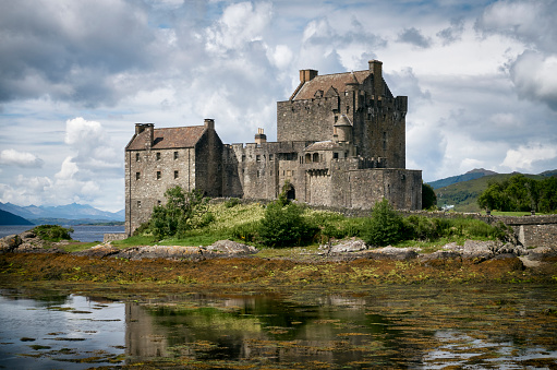 Dornie, United Kingdom- July 18, 2023: Photograph of Eilean Donan Castle and Loch Duich near Dornie in the scottish highlands.