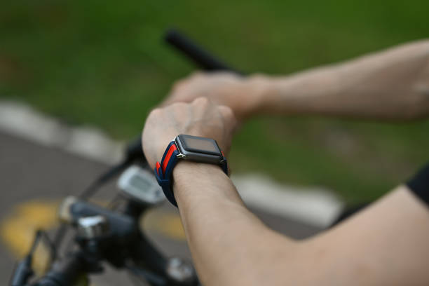 istock Cropped image of man cyclist sitting on his bicycle and checking sport activity progress data on smartwatch. 1620280687