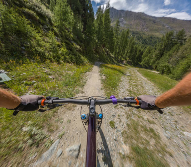 istock Mountain biker descends mountain ridge 1620292774