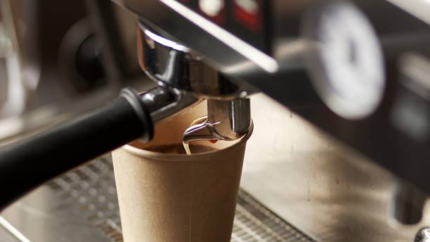 istock Preparing espresso on a coffee machine in a specialized coffee shop 1620322232