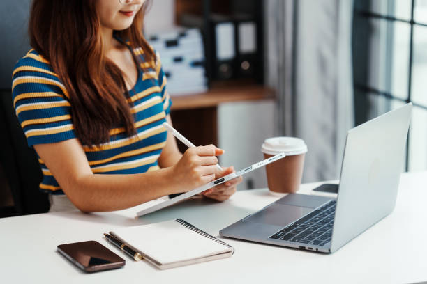 istock Excited Asian female student doing Online MBA and Business Degree Programs and learn indian language, online MBA course give you same level education provided conventional business school 1620327523