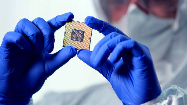 istock The scientist works in a modern scientific laboratory for the research and development of microelectronics and processors. Microprocessor manufacturing worker uses computer technology and equipment. 1620328669