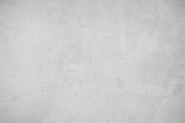 istock Concrete on stone texture for background in black, grey and white colors. Cement and sand wall of tone vintage. Close up retro plain white color concrete wall or grey colour texture cement stone work 1620337930