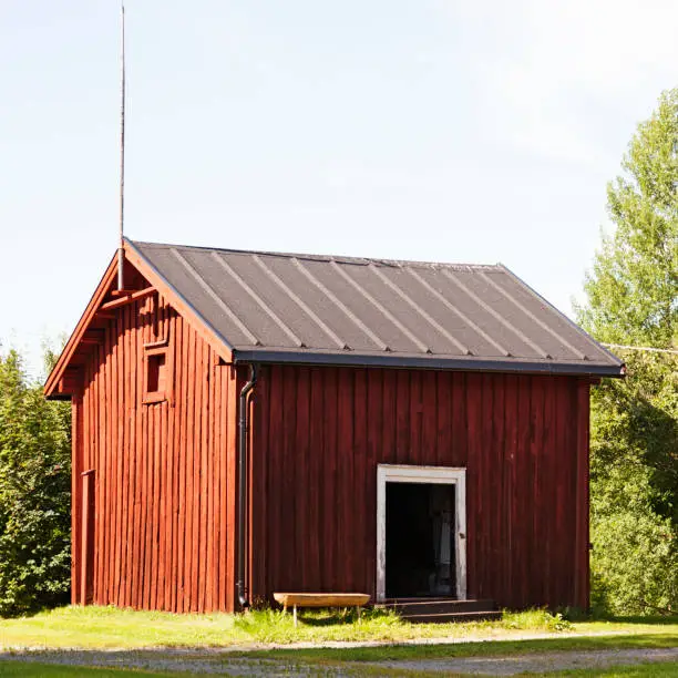 Skelleftea, Norrland Sweden - July 31, 2020: old red wooden house by Nordan