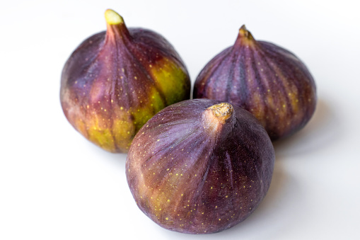 Fresh figs. Food Photo. whole and sliced figs fruits on rustic background