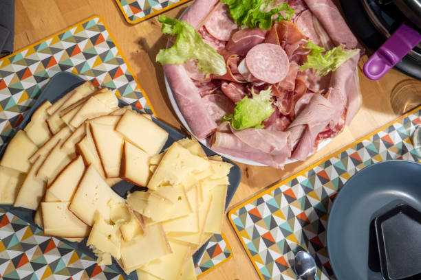 istock Raclette cheese and meat, french tradition 1620380408