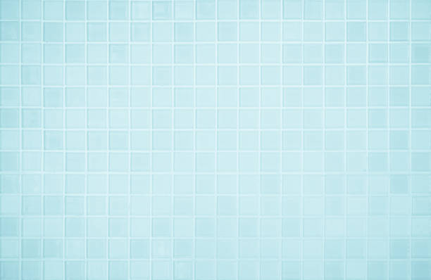 istock Blue light ceramic wall checkered and floor tiles mosaic background in bathroom and kitchen. Design pattern geometric with grid wallpaper texture decoration. Simple seamless abstract surface clean. 1620384374