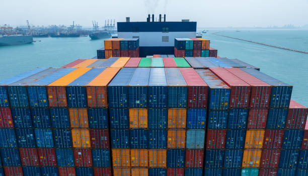 istock Stern of large cargo container ship import export container box on the ocean sea on blue sky back ground concept transportation logistic and service to customer and supply chang 1620397223