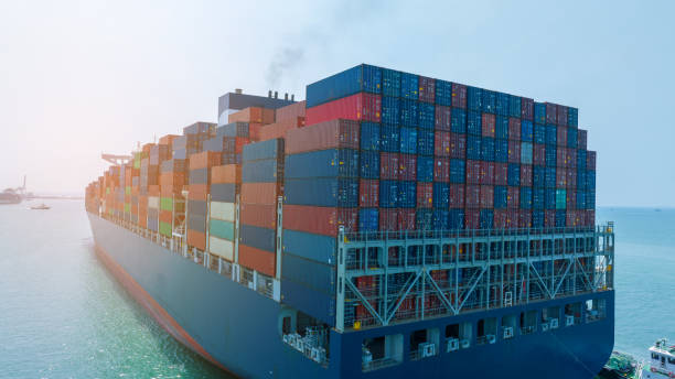 istock Stern of large cargo container ship import export container box on the ocean sea on blue sky back ground concept transportation logistic and service to customer and supply chang 1620397228