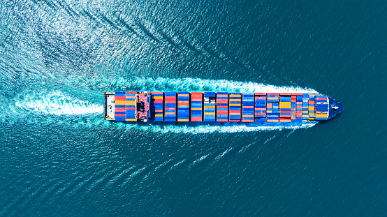 Top view of Cargo container Ship, cargo vessel ship carrying container and running for import export concept technology freight shipping sea freight by Express Ship.