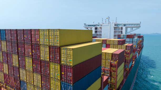 istock Stern of large cargo container ship import export container box on the ocean sea on blue sky back ground concept transportation logistic and service to customer and supply chang 1620397809