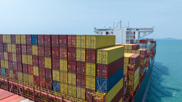 istock Stern of large cargo container ship import export container box on the ocean sea on blue sky back ground concept transportation logistic and service to customer and supply chang 1620397812