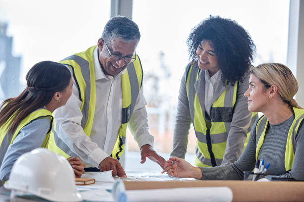 istock Planning, floor plan and business people in office meeting, teamwork and construction, happy design or engineering. Paper, blueprint and manager, women and man talking ideas of sketch in architecture 1620460032