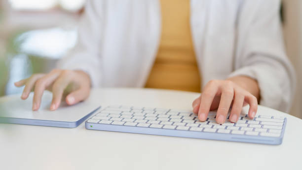 istock Close-up photo , using the keyboard Electronic devices working, playing social media 1620460623