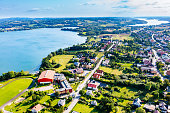 Aerial view of a small town on the lake shore in Kashubia (Kaszuby), Poland.