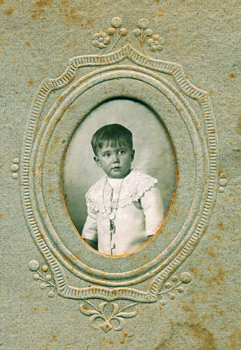 Child Portrait in vintage picture frame. 1915.