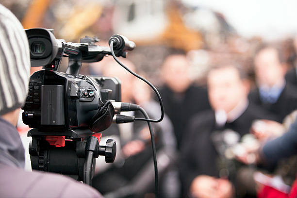 istock Covering an event with a video camera 162051334