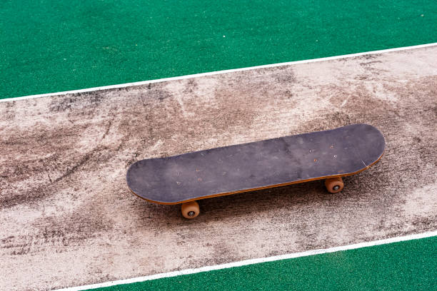 istock An image shows a skateboard placed on a skateboard track in a stadium. 1620519663
