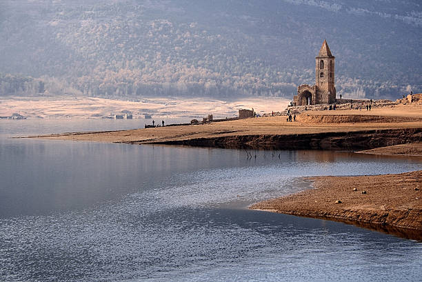 Medieval church of Sant Roma de Sau emerged from the Sau reservoir during a period of drought in Catalonia.