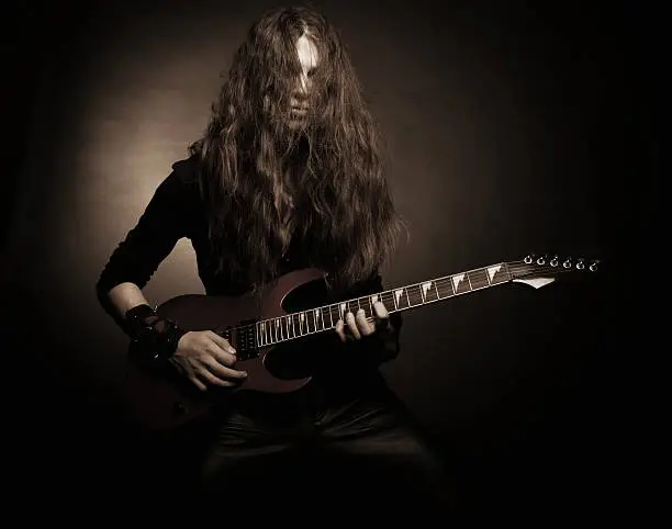 Photo of Furious metal guitarist