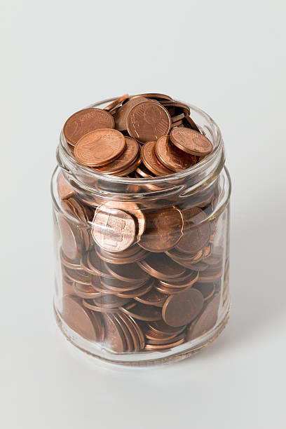 istock JAR FULL OF COINS 162055622