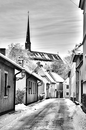 Old cobblestone street in an old village wintertime