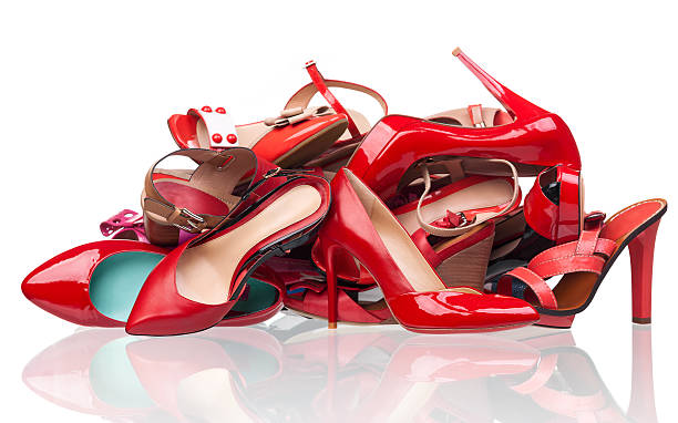 istock Pile of various red female shoes 162056446