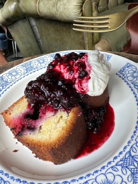 Sweet cake with jam and ice cream