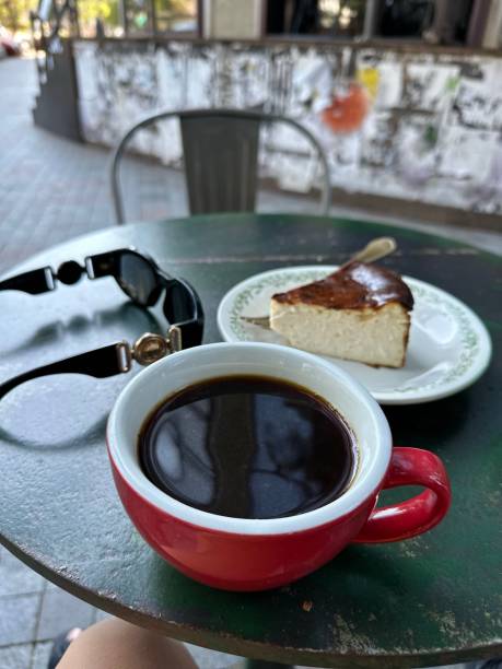 istock One cup of coffee and cheese cake. 1620585405