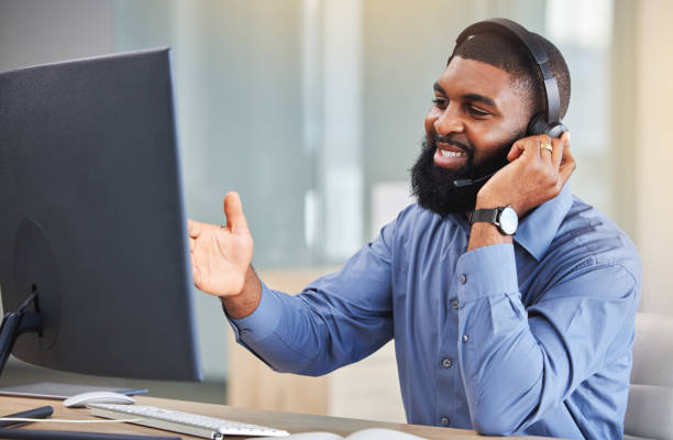 istock Call center, computer and happy man, consultant or agent speaking, advice and customer services or business support. Online sales, financial advisor or african person communication, contact us or FAQ 1620633505