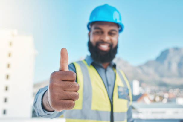 istock Man, engineering portrait and thumbs up for city development, construction goals and like, yes or support sign. Architecture person, worker or contractor success, safety gear and ok or good job emoji 1620633517