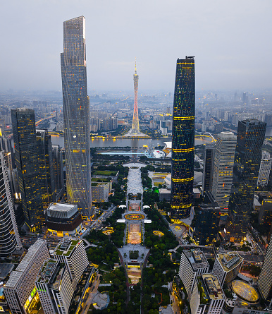 Landmark view of Guangzhou amazing cityscape in the the capital city of Guangdong province of China. Aerial skyline of Chinese metropolis city and Zhujiang New Town area above the Huacheng Square with Canton tower dominating the scene