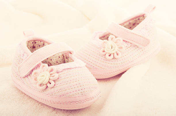istock baby booties  for newborn girl 162066006