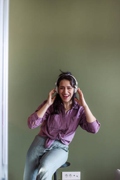 istock Young woman with headphones 1620679058