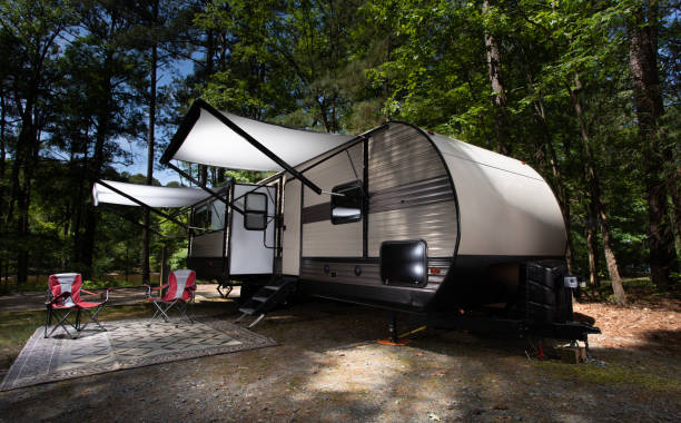 istock White awnings out on an RV in a campsite 1620713415