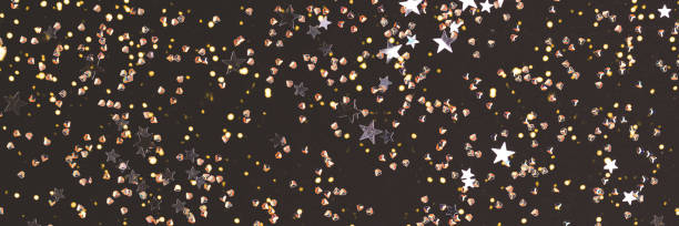 istock Banner with silver stars and crystals confetti on a black background. 1620764656