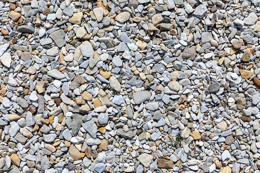 pattern of gravel stone at the beach on a river