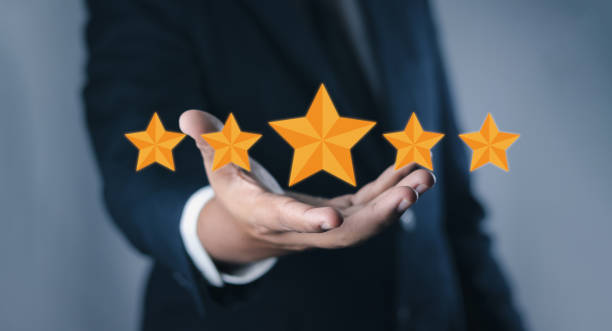 istock Customer or User give rating to service experiences review satisfaction feedback survey on online application, Customer can evaluate quality of service leading to reputation ranking of business. 1620785965