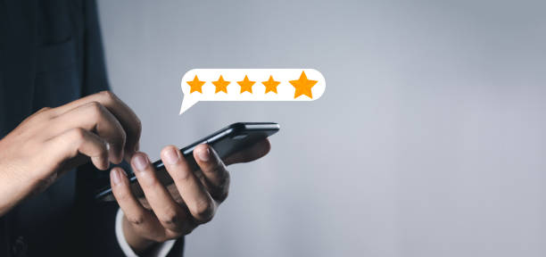 istock Customer or User give rating to service experiences review satisfaction feedback survey on online application, Customer can evaluate quality of service leading to reputation ranking of business. 1620786040